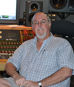 Music Board Profile of man in front of music board