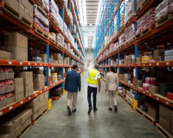 CSCP Tile 1 People walking through storage room