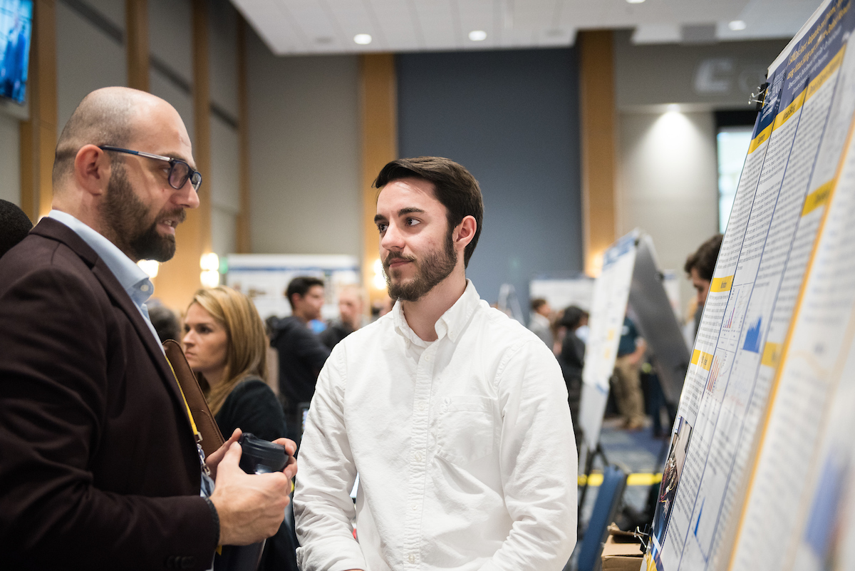 engineering-cpe.jpg professor and student talking about continuing education