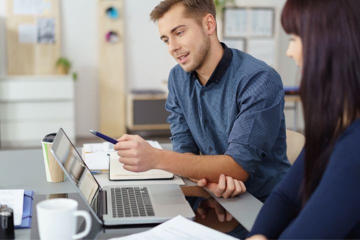 Freight Broker Image 2 2 People at a Desk