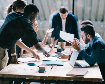 Supply Chain Fundamentals Benefits People around desks
