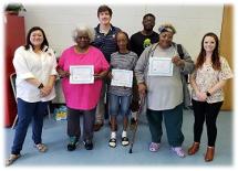 Small group with their certificates