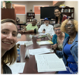 Selfie of a group around a table