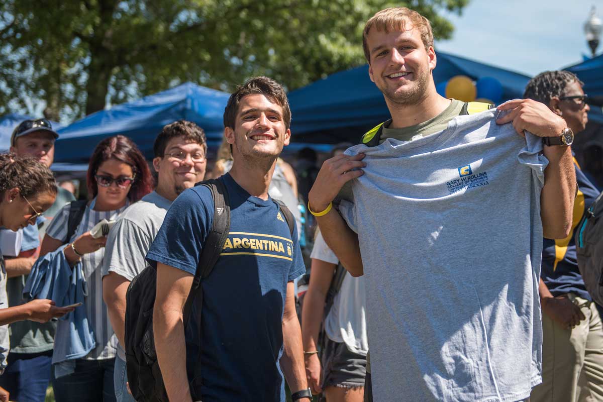 Undergraduate programs Two students showing off moc pride