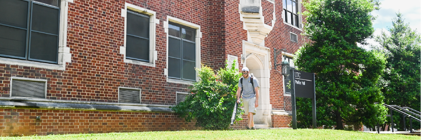 Grounds Crew, 2020 Grounds crew blowing leaves off of lawn in front of Pfeiffer Hall, 2020.