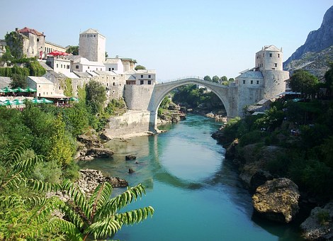 Bosnia Balkans White castle bridge over water in Balkans