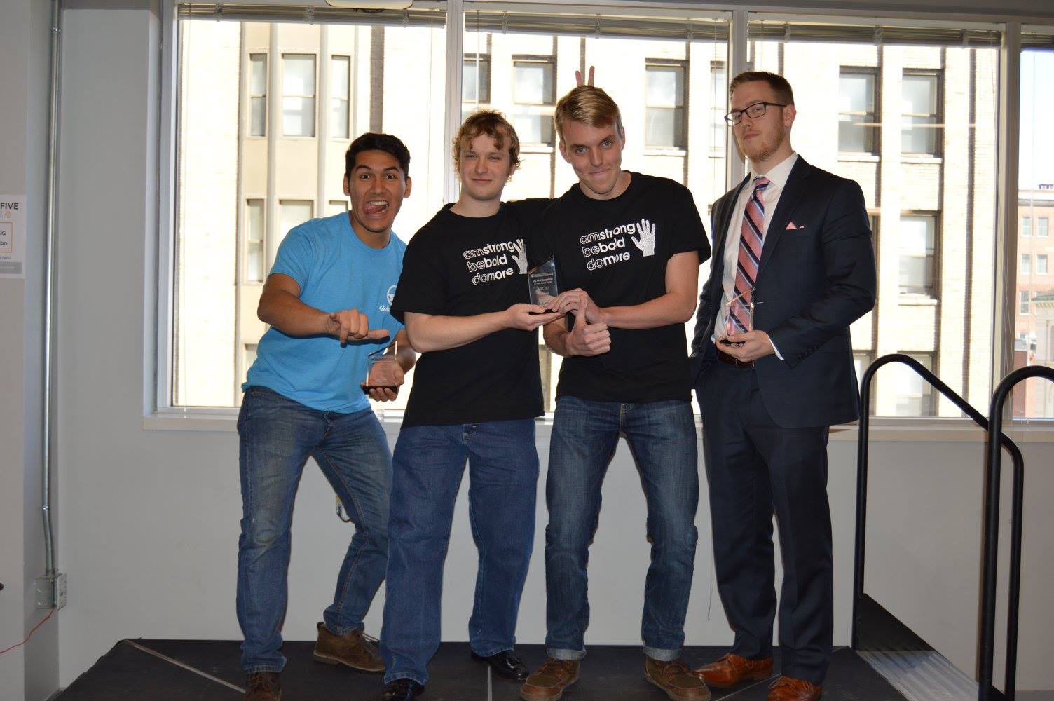 SEEC 2017 Pitch Winners Four guys standing together for a picture in stairwell