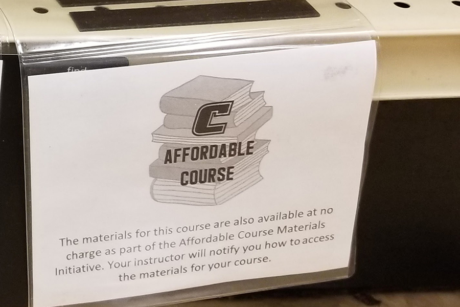 sign in bookstore indicating class uses affordable course materials