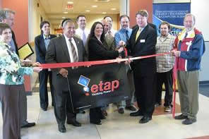 Group of people at ribbon cutting ceremony