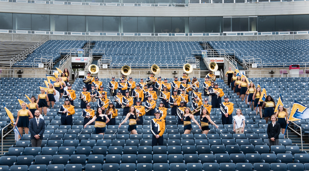 Marching Mocs in the bleachers at Finley Stadium