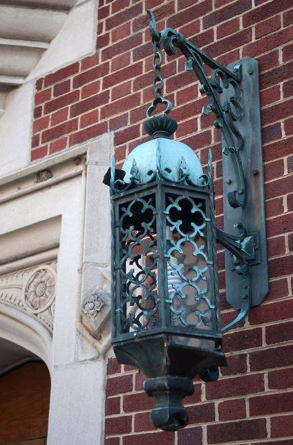 Exterior light on brick wall of Pfeiffer Hall