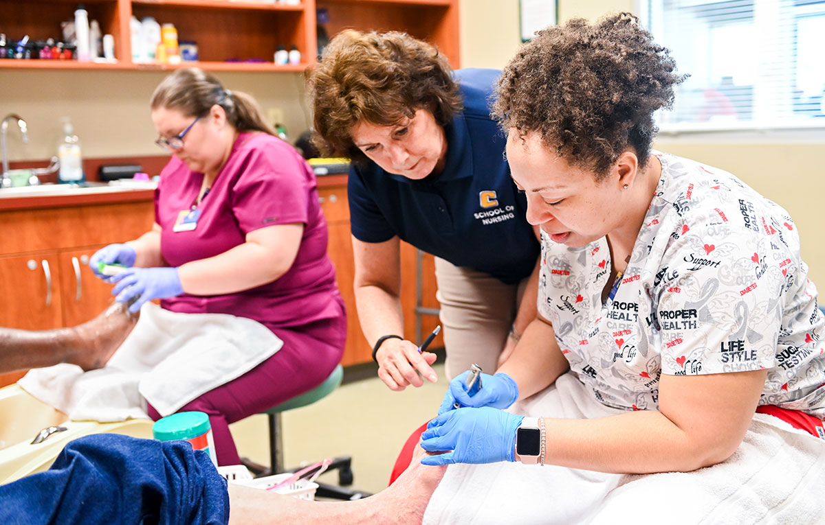 Gateway Foot Clinic Nursing students working on feet