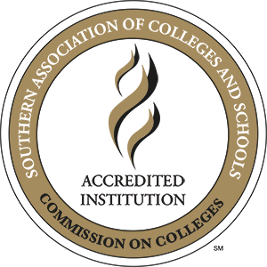 SACSCOC Stamp SACSCOC Logo, which is a circle with the words "Southern Association of Colleges and Schools" on a ring next to "Commission on Colleges" on the same ring. Inside the ring printed is "Accredited Institution"