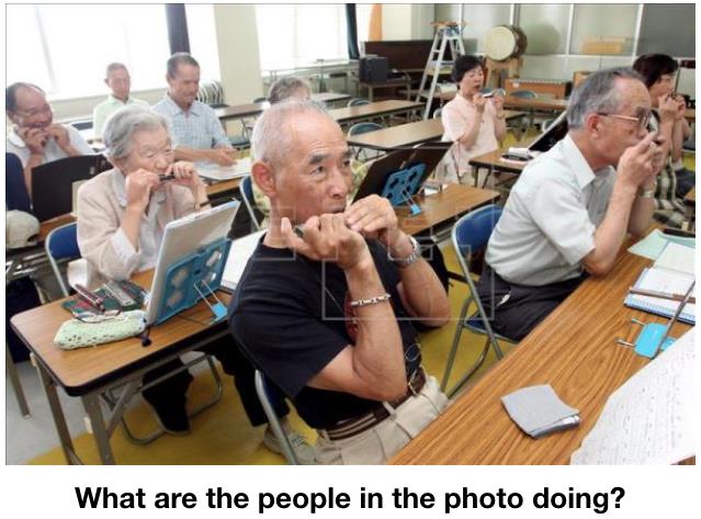 Slide No. 146 from PowerPoint: What are the people in the photo doing?