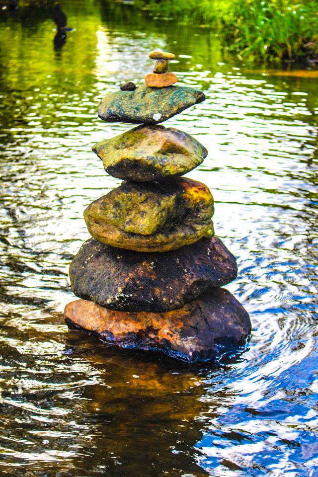 Stacked rocks by the water