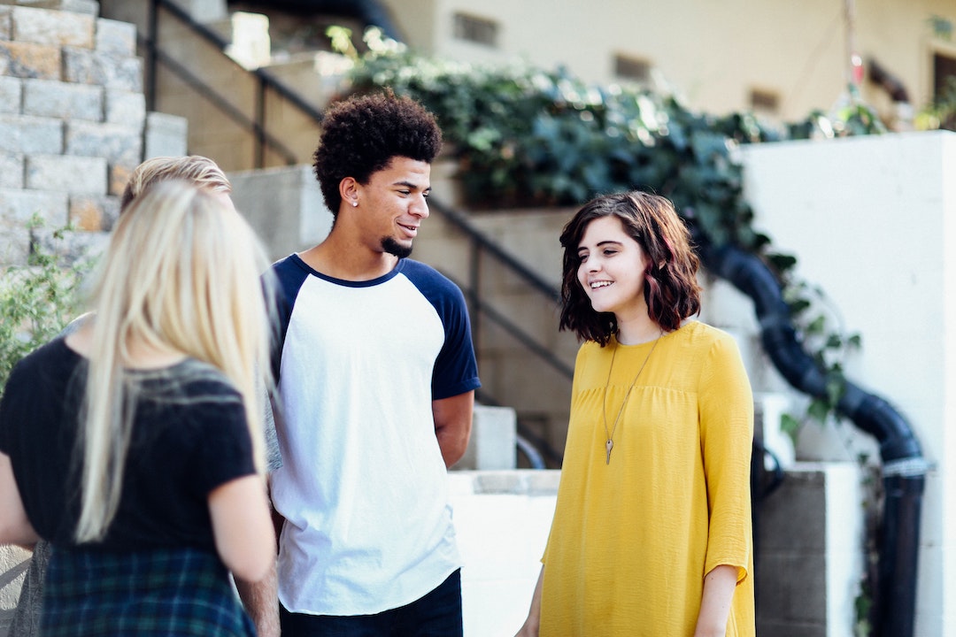 group of young people conversing