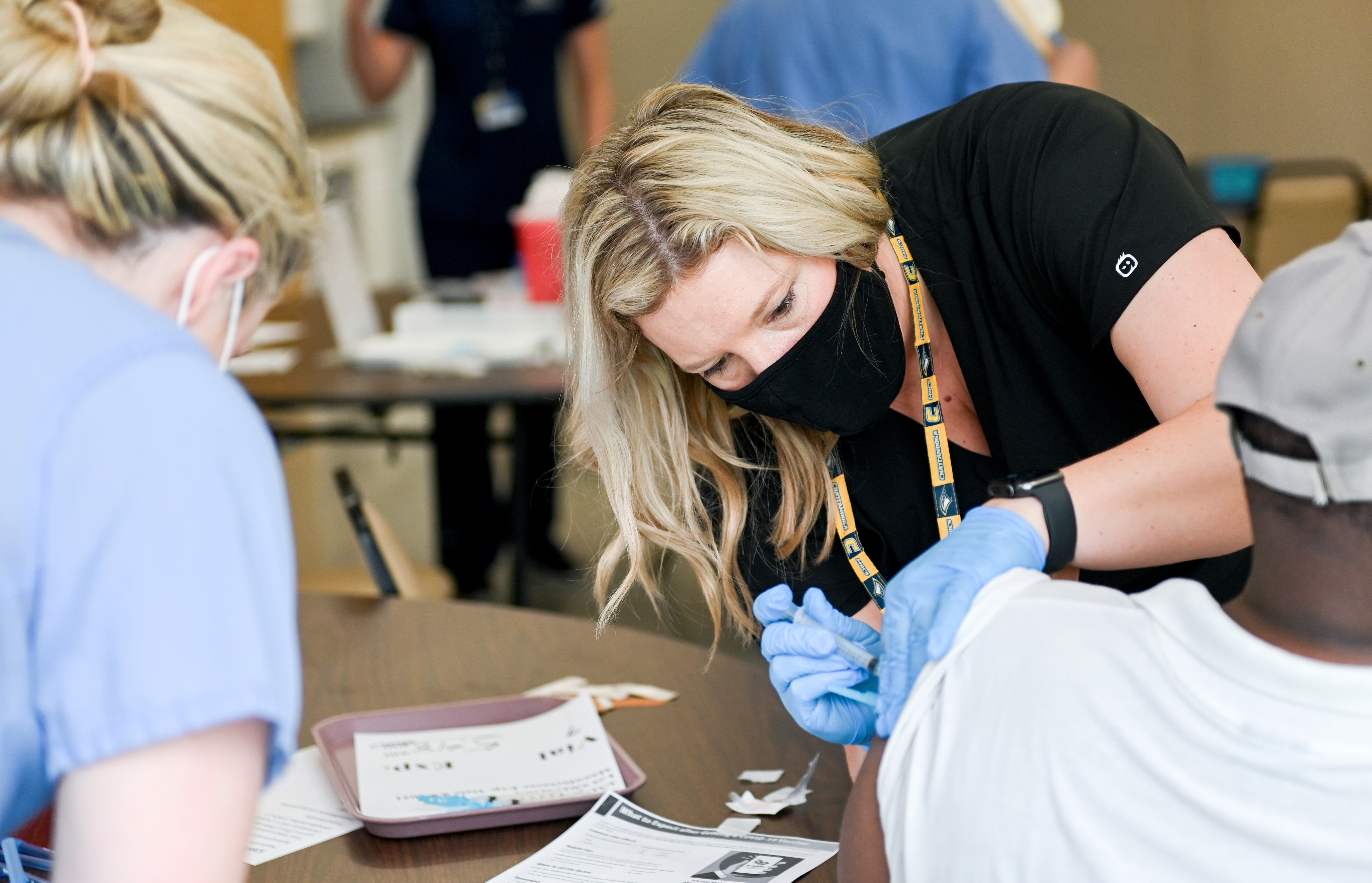 Nursing volunteers giving COVID19 vaccinations