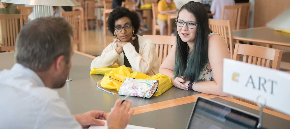 Advising Students talking to an advisor