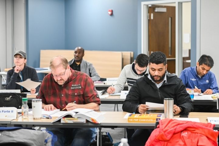 A group of CPE students sitting in a classroom studying