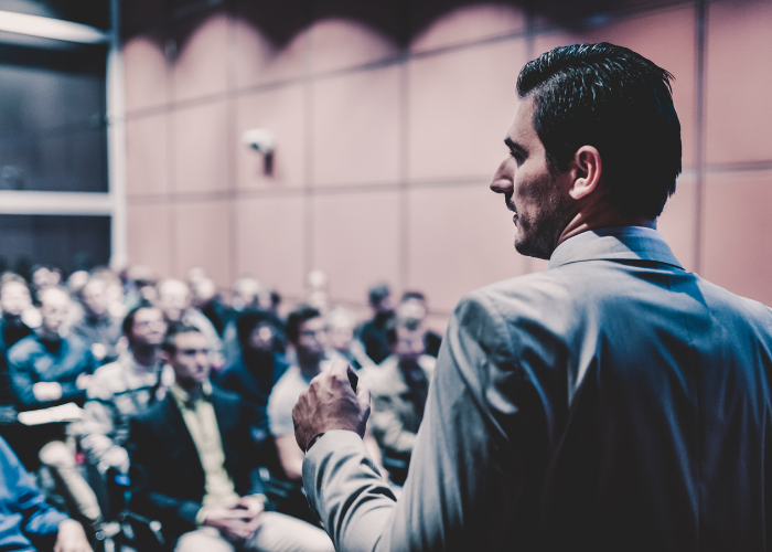 man speaking to a group