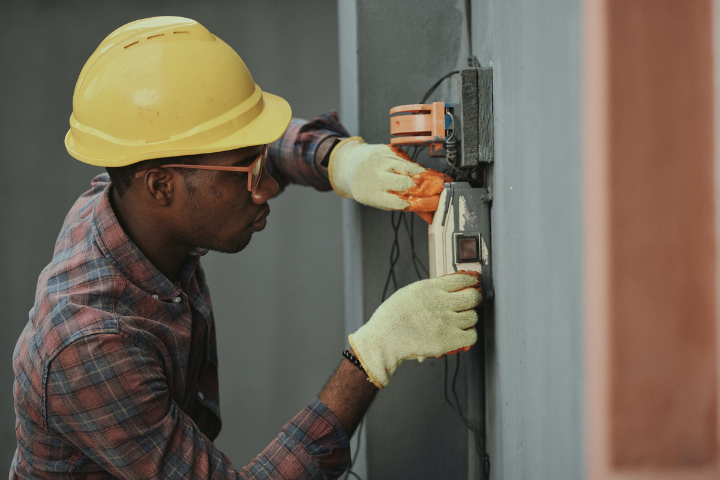 male electrician working with wires