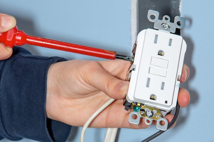 electrician working with wires