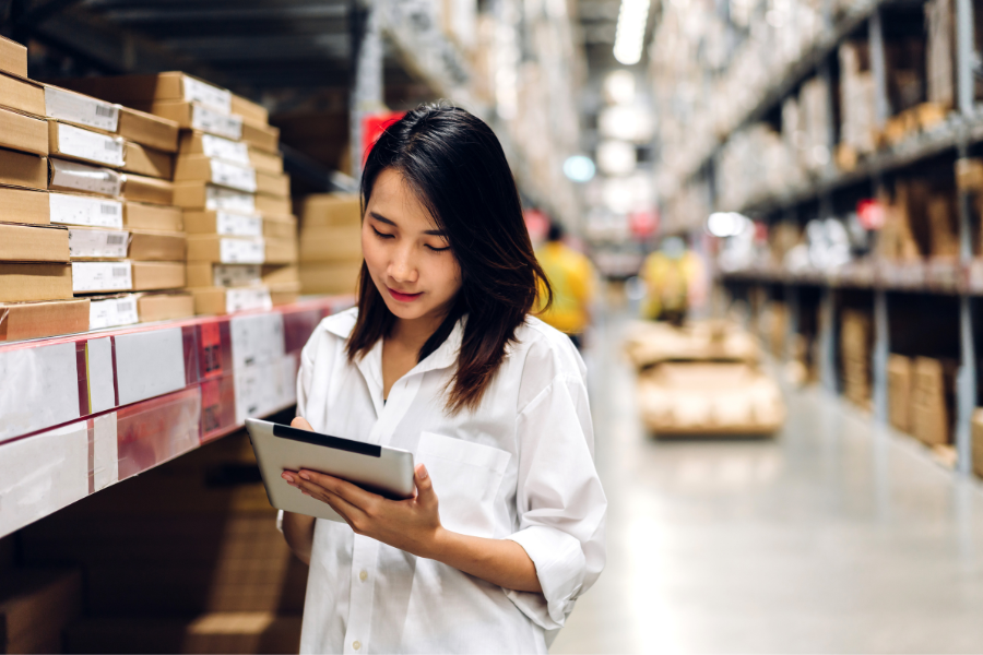 female logistics professional with clipboard