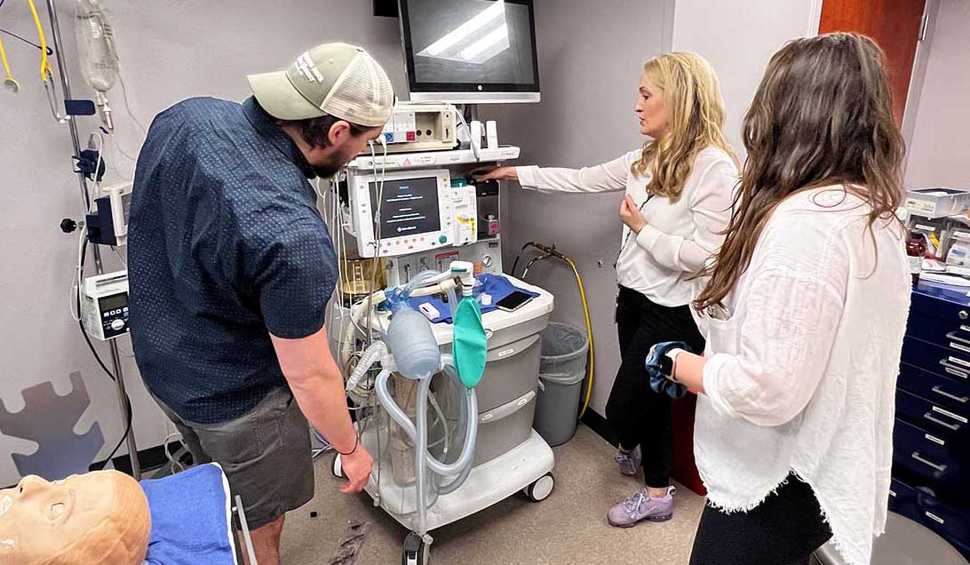 Students and faculty at Anesthesia Machine