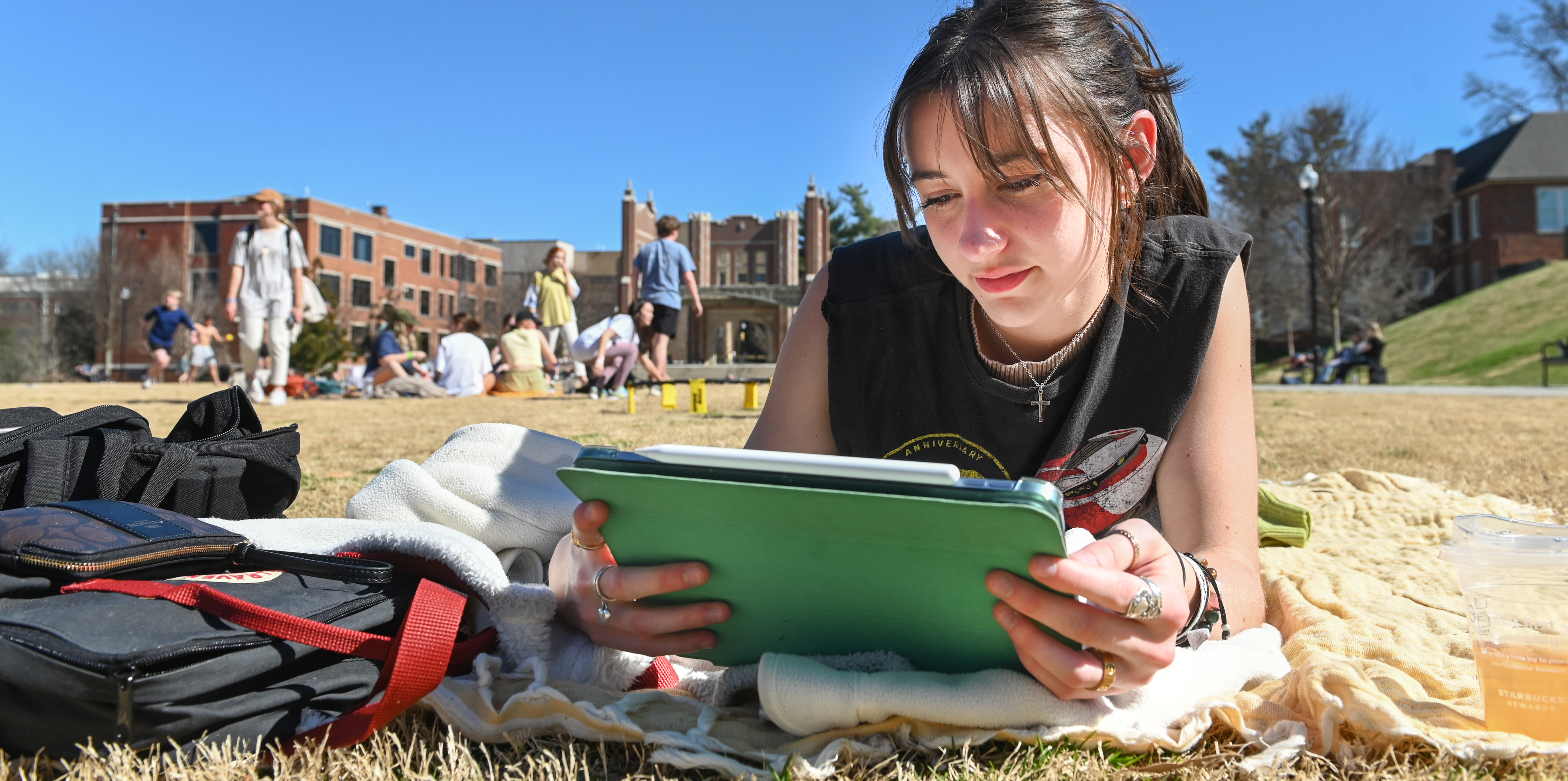 Girl Outside on a tablet