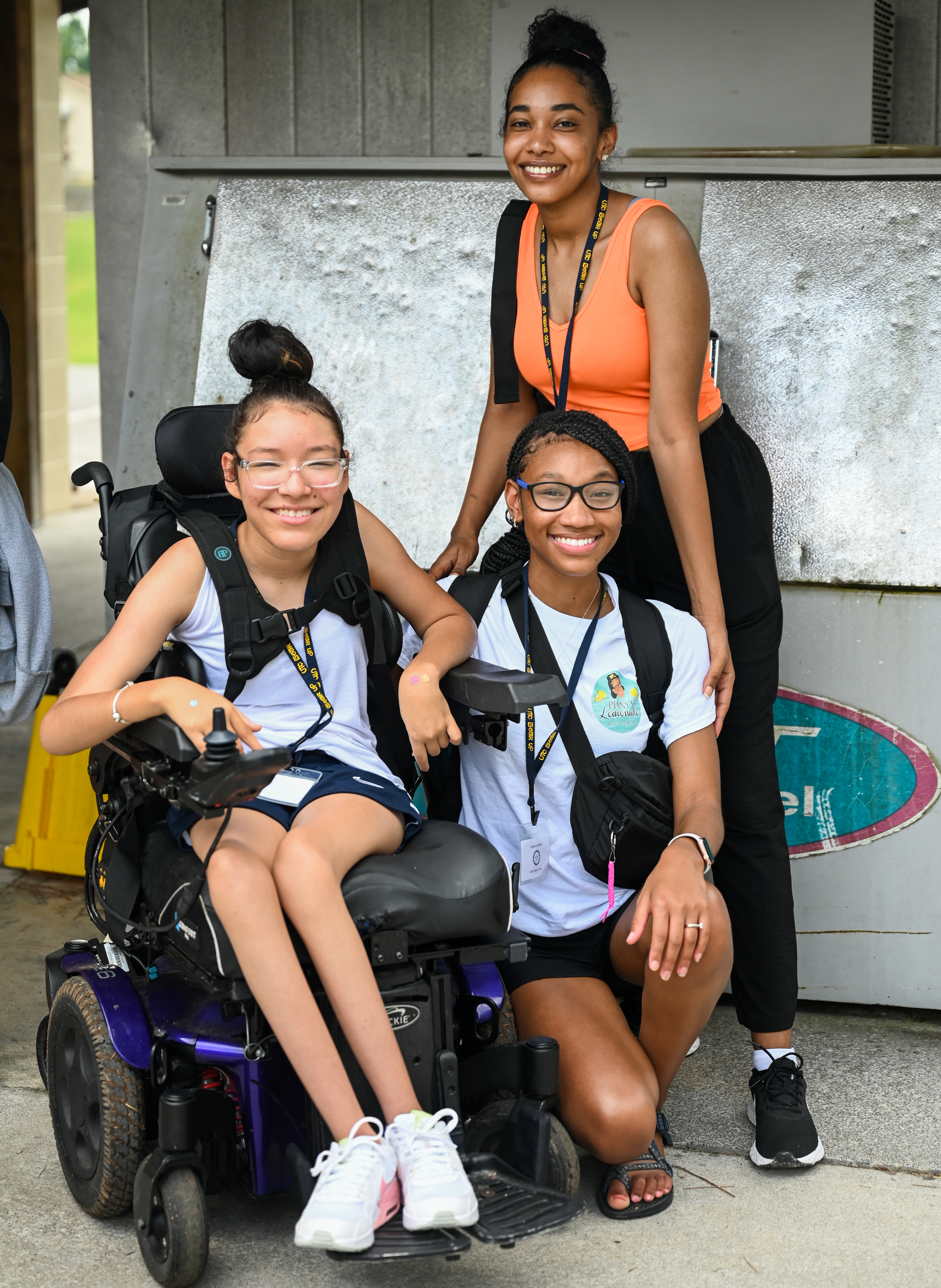 Three people posing for photo
