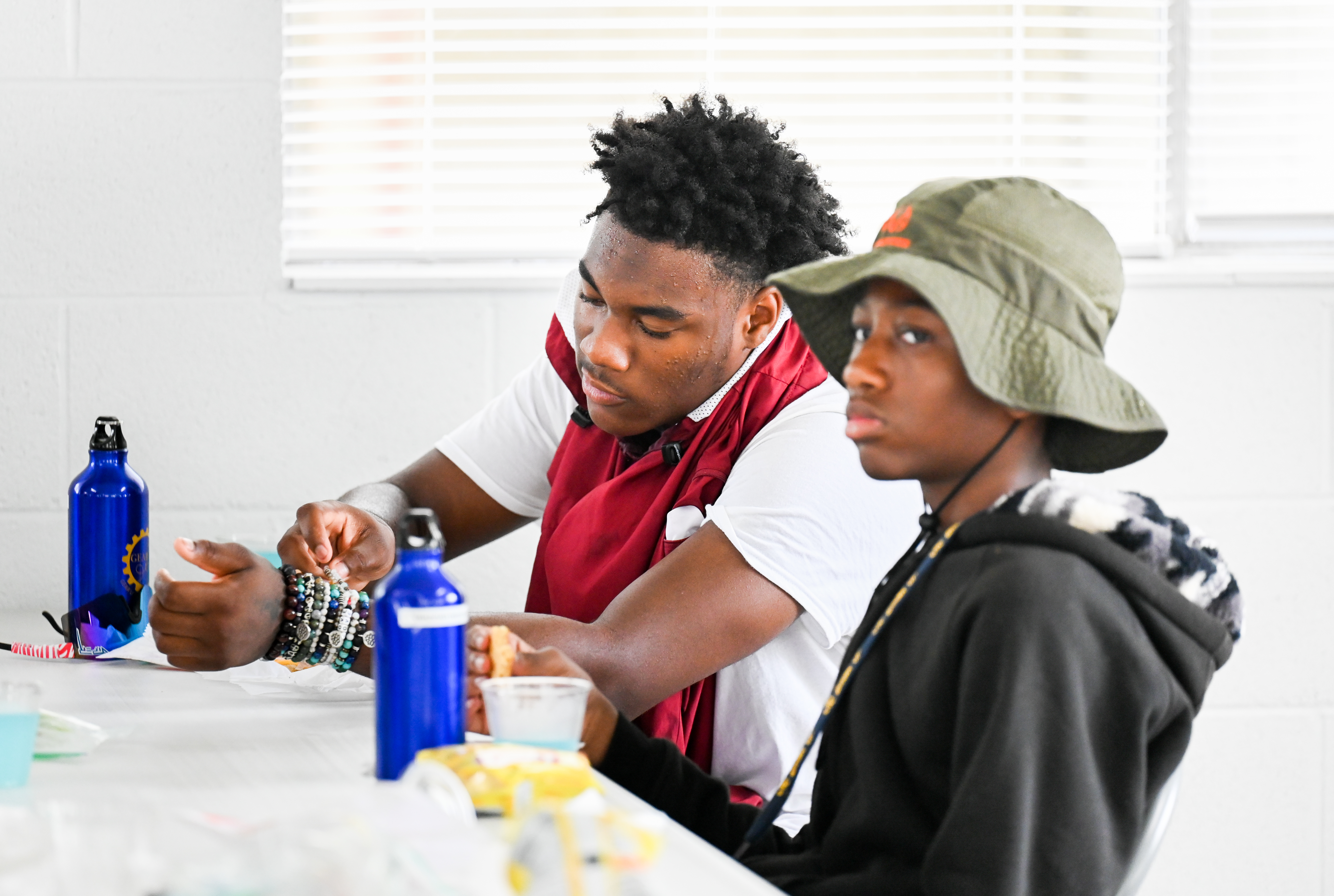 Two students sitting at table