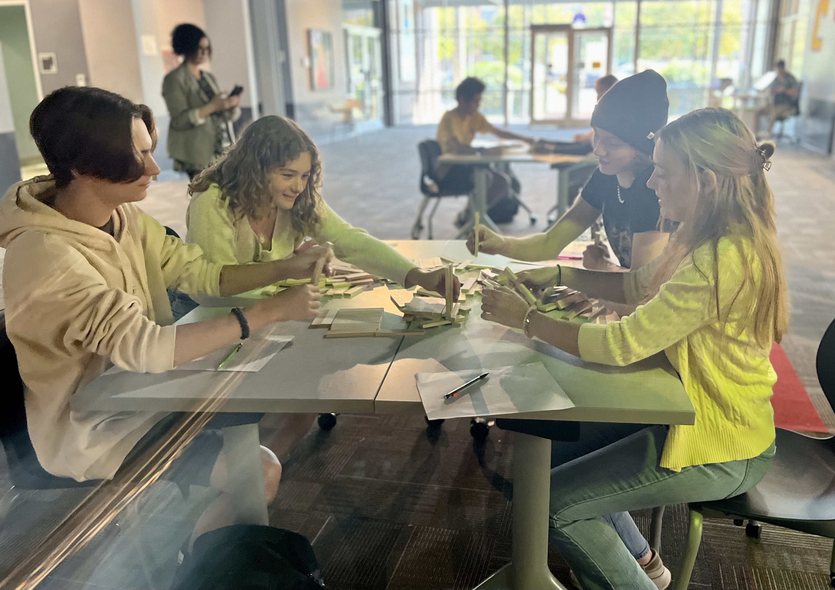 FYE Students at the Challenger Center 2 Students collaborate on an activity at the Challenger Center