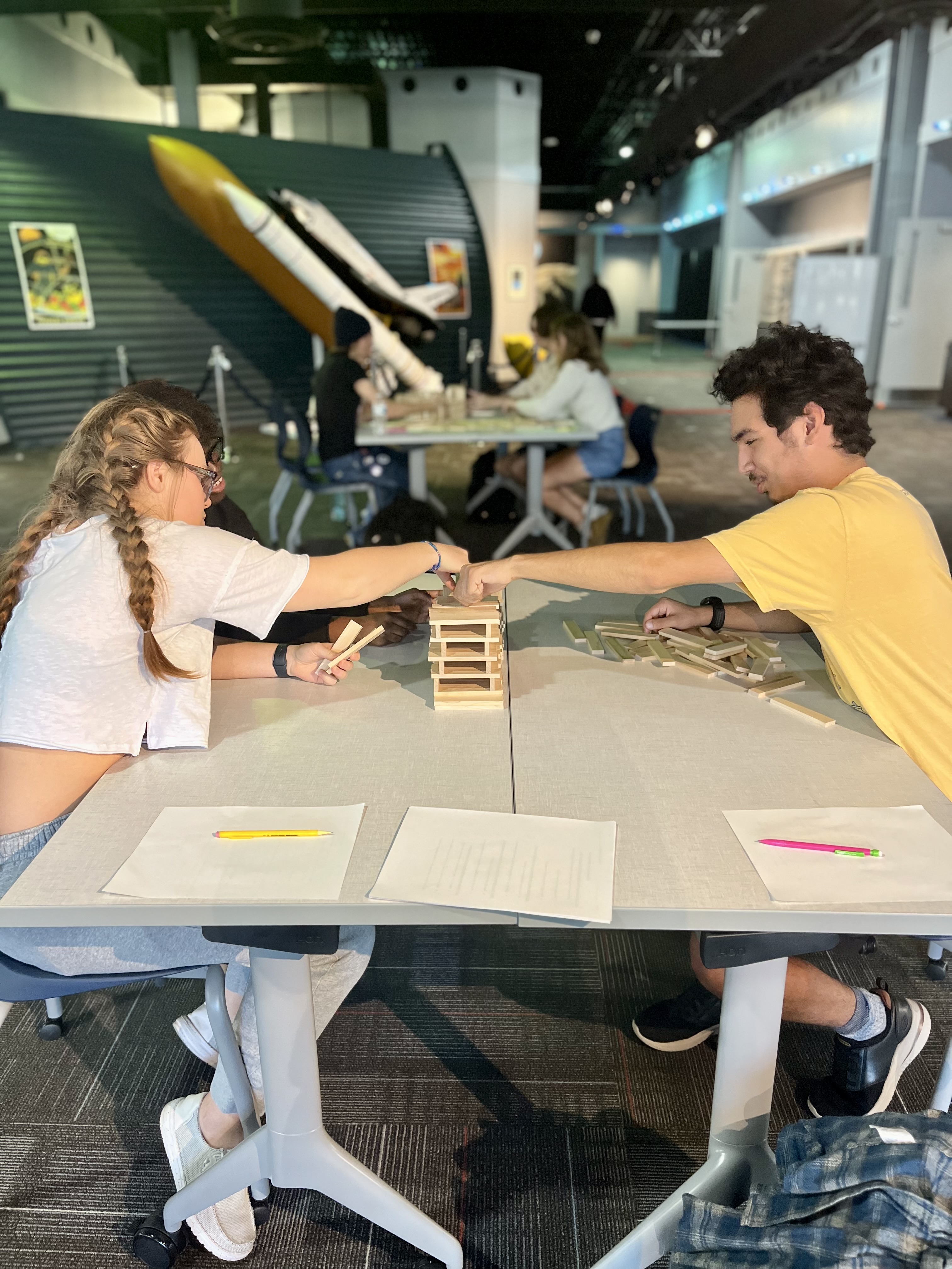 FYE Students at the Challenger Center 3 Students collaborate on an activity at the Challenger Center