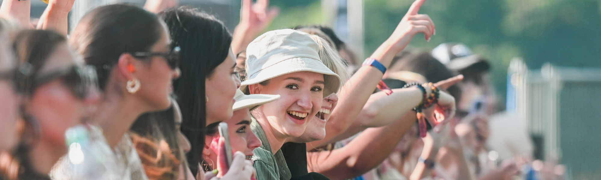 Students standing in line at a concert