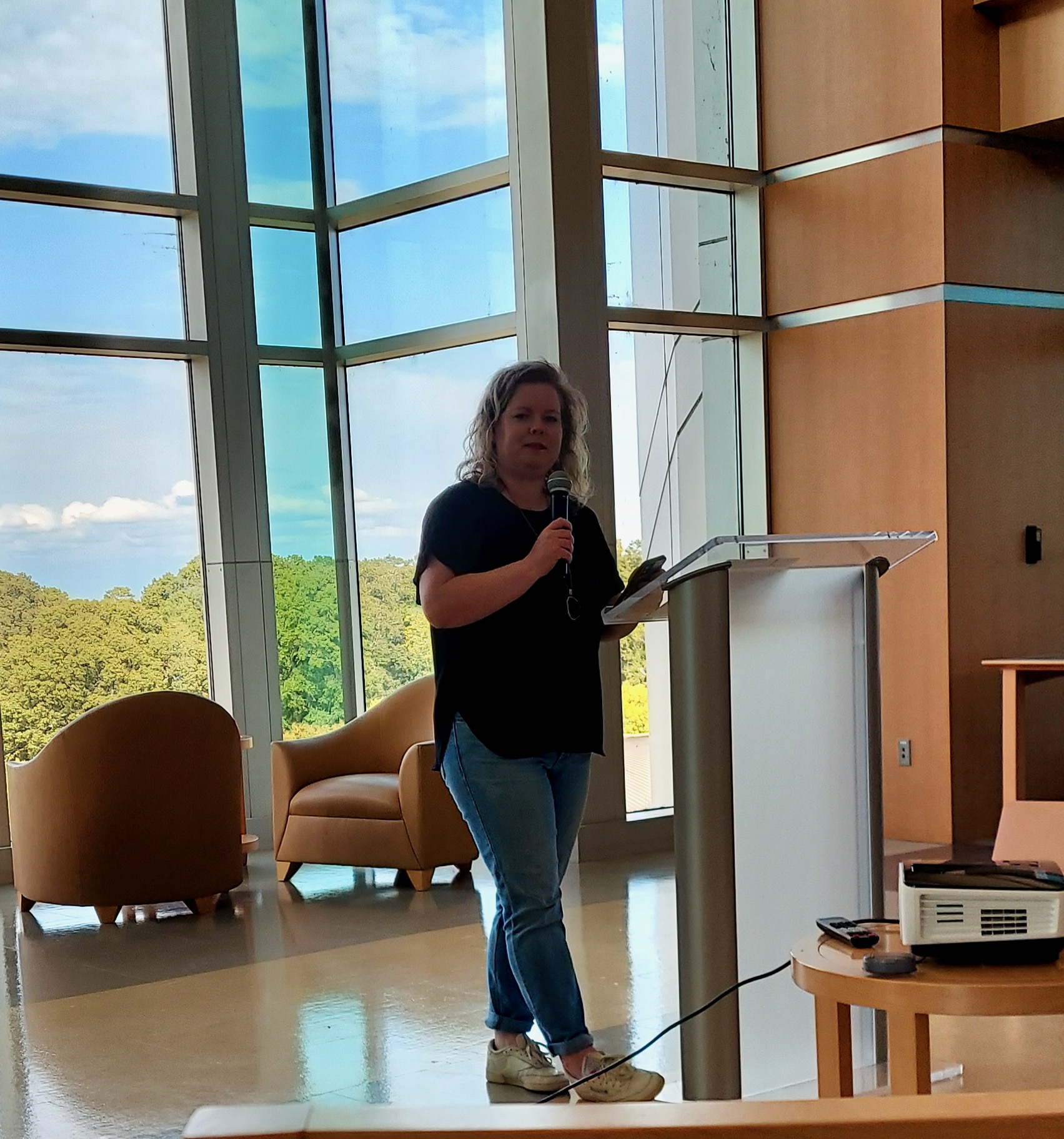 Dr. Megan Hartline introducing Dr. Johnson Sackey at Getting Bed Bugs: Spatializing Invasion’s Rhetorical Ecology, Sept. 2023