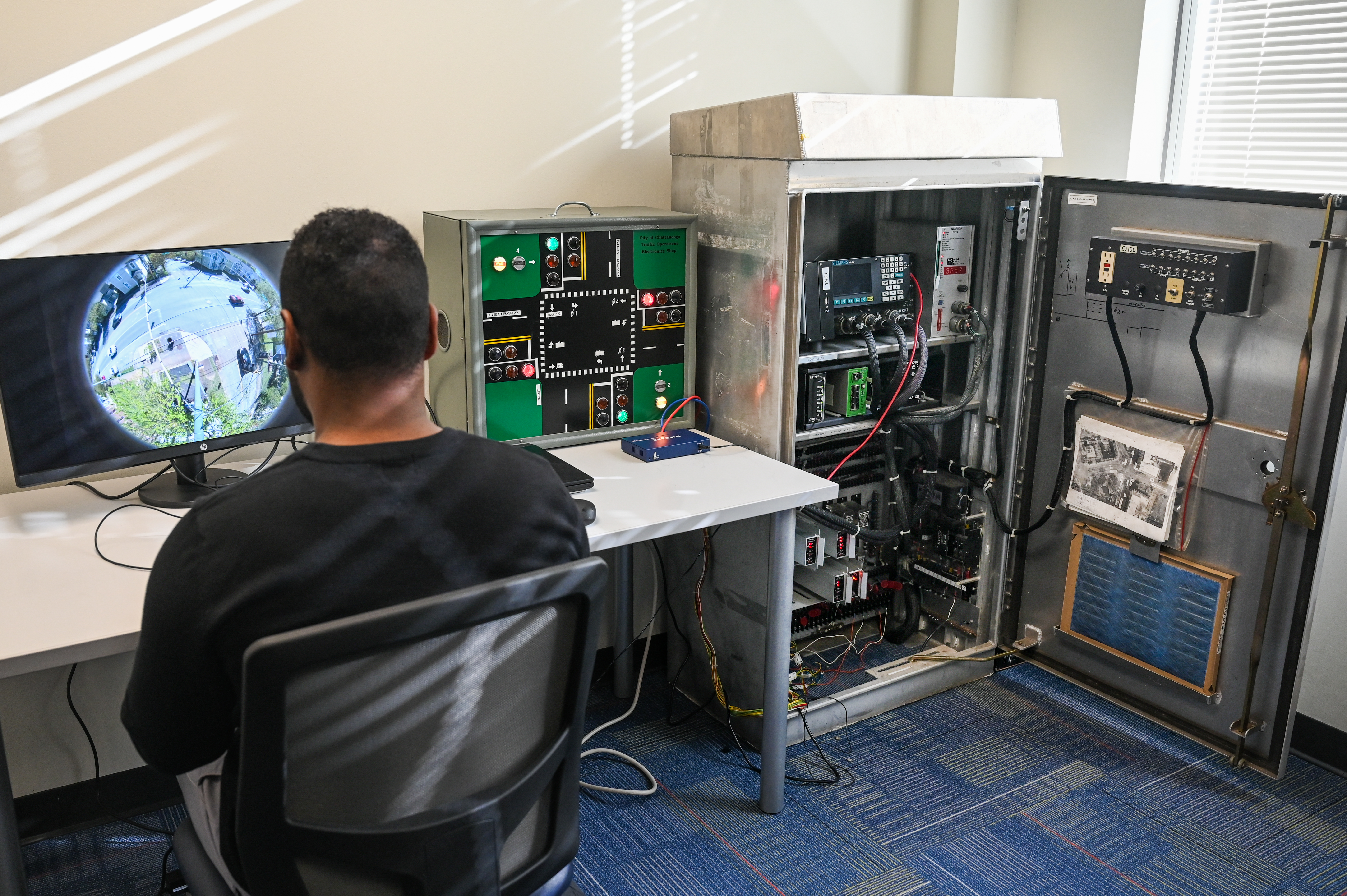 Male UTC student in a computer engineering space
