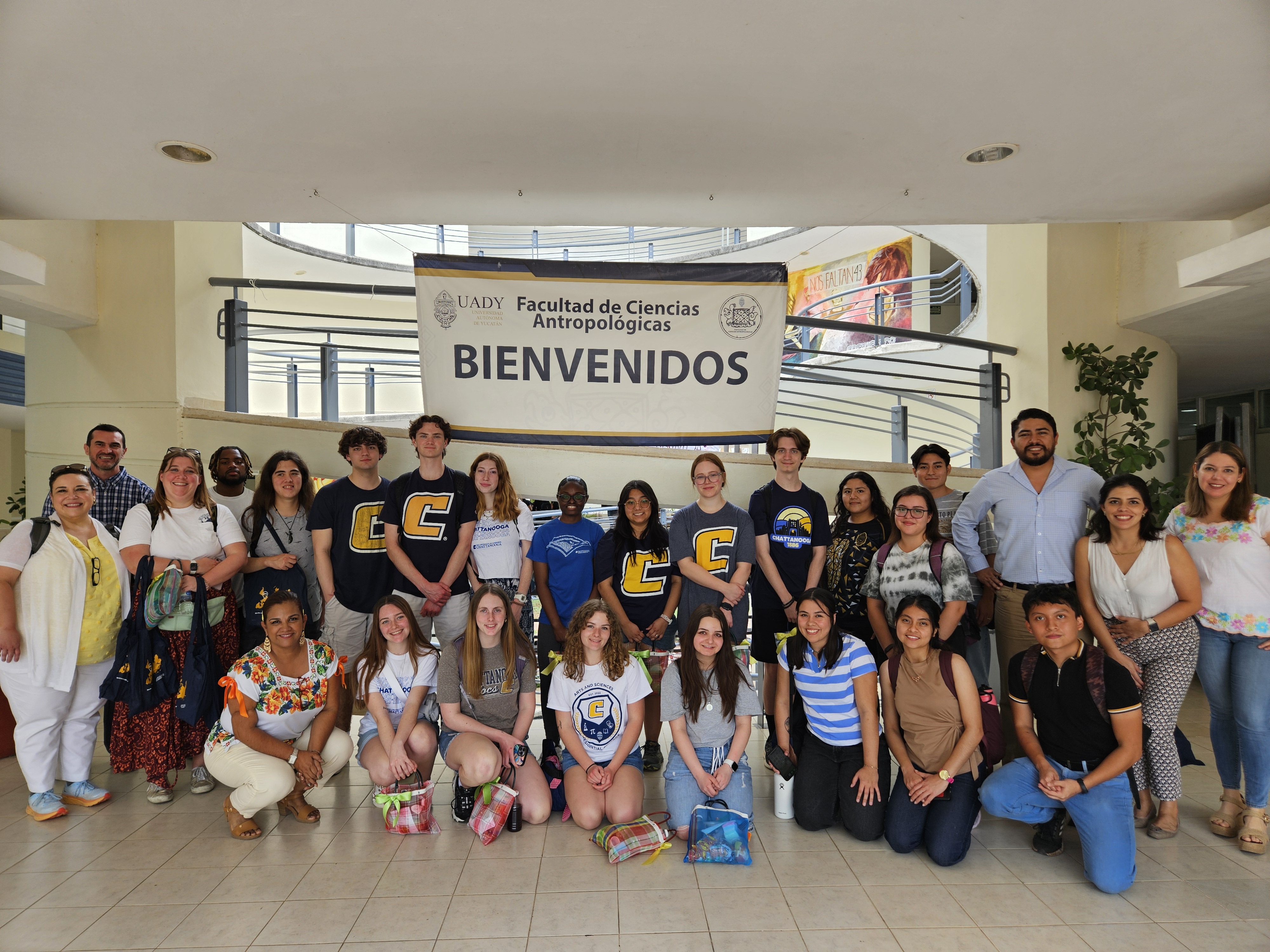 A&SRC Explorers pose with UADY students and faculty in front of UADY's Welcome sign Students and faculty pose in front of UADY's Welcome sign