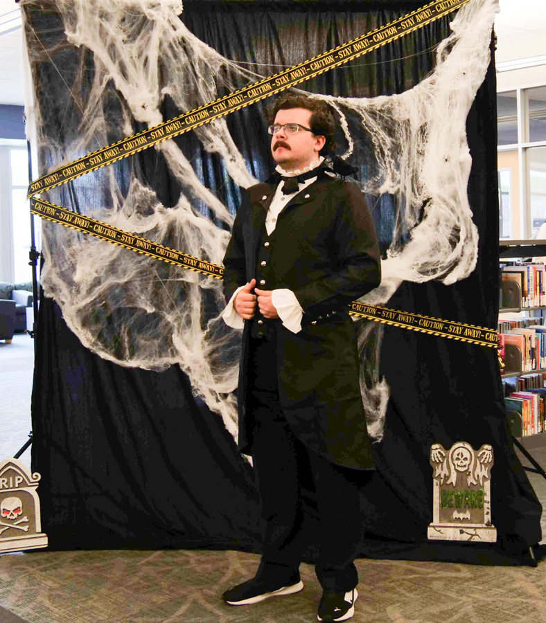 Edgar Allen Poe with his raven named Eleanor