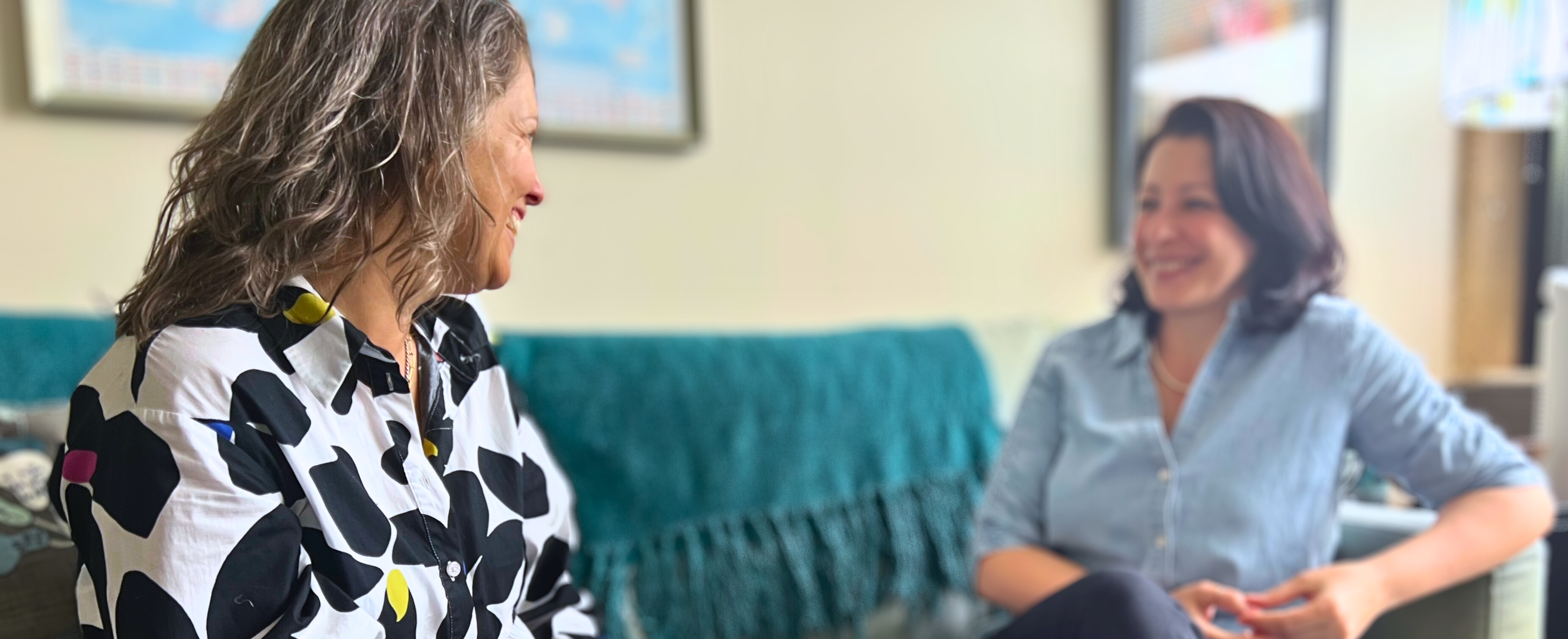CC staff Picture of two individuals talking with each other.