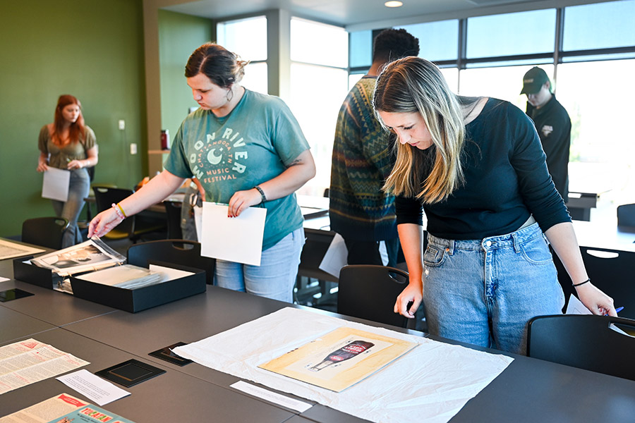 Students in Professor Kershaw’s ART 3999: Contemporary Art class working with Special Collections’ resources in Fall 2024. Students in Professor Kershaw’s ART 3999: Contemporary Art class working with Special Collections’ resources in Fall 2024.