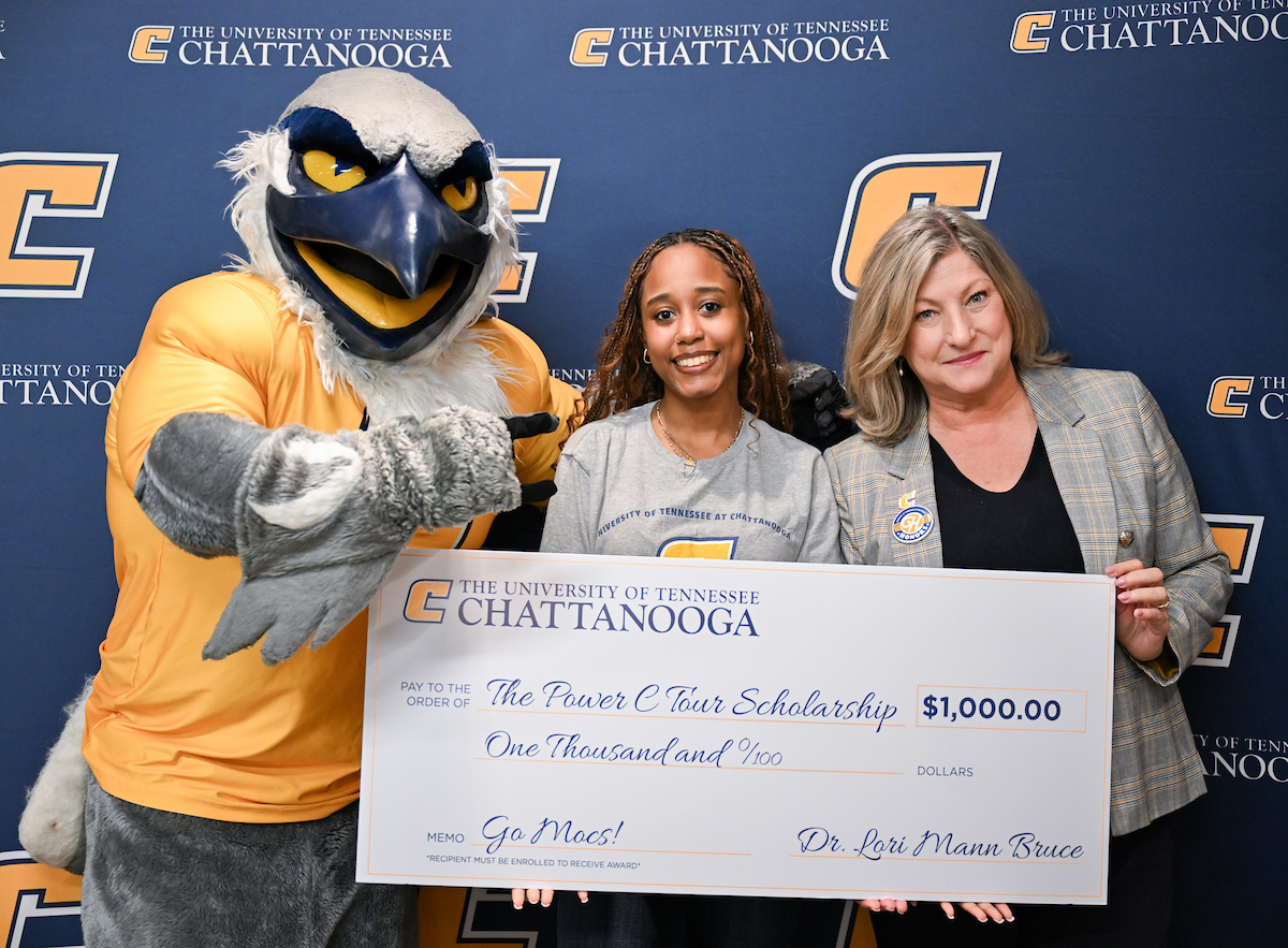Arianna Few, center, poses with Scrappy and Chancellor Lori Mann Bruce during the Power C Tour, Wednesday, March 25, 2026 at Chattanooga State.
