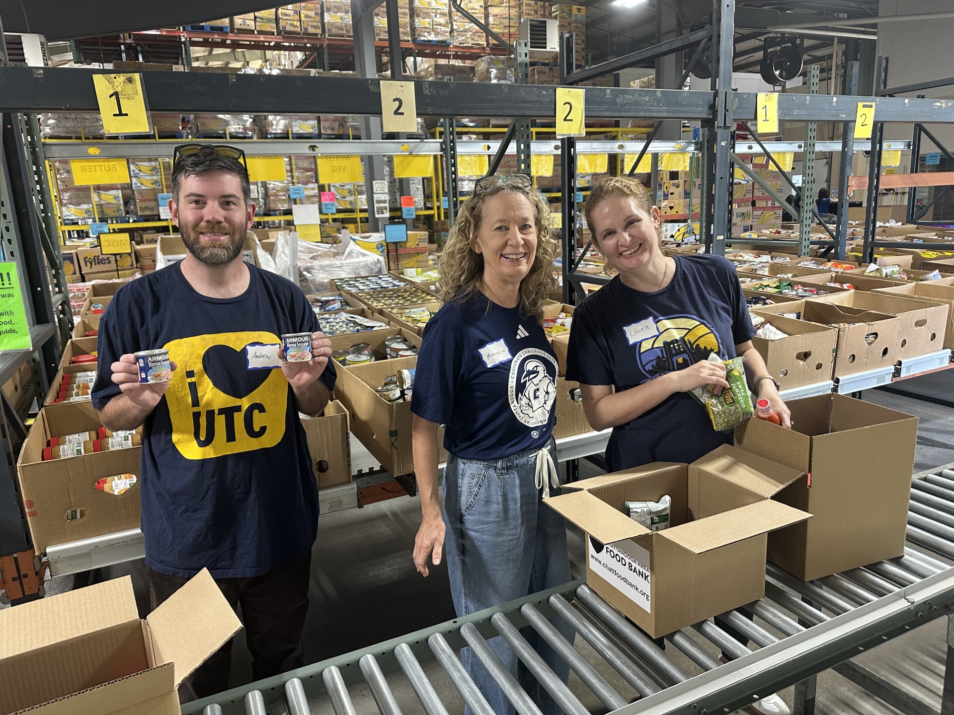 Image of people volunteering in a food bank.