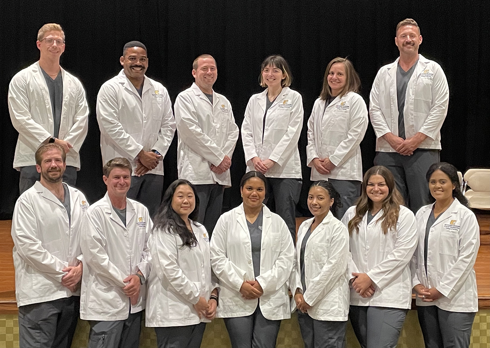Accelerated BSN Nursing students receive their white coats at a ceremony on June 24, 2026.
