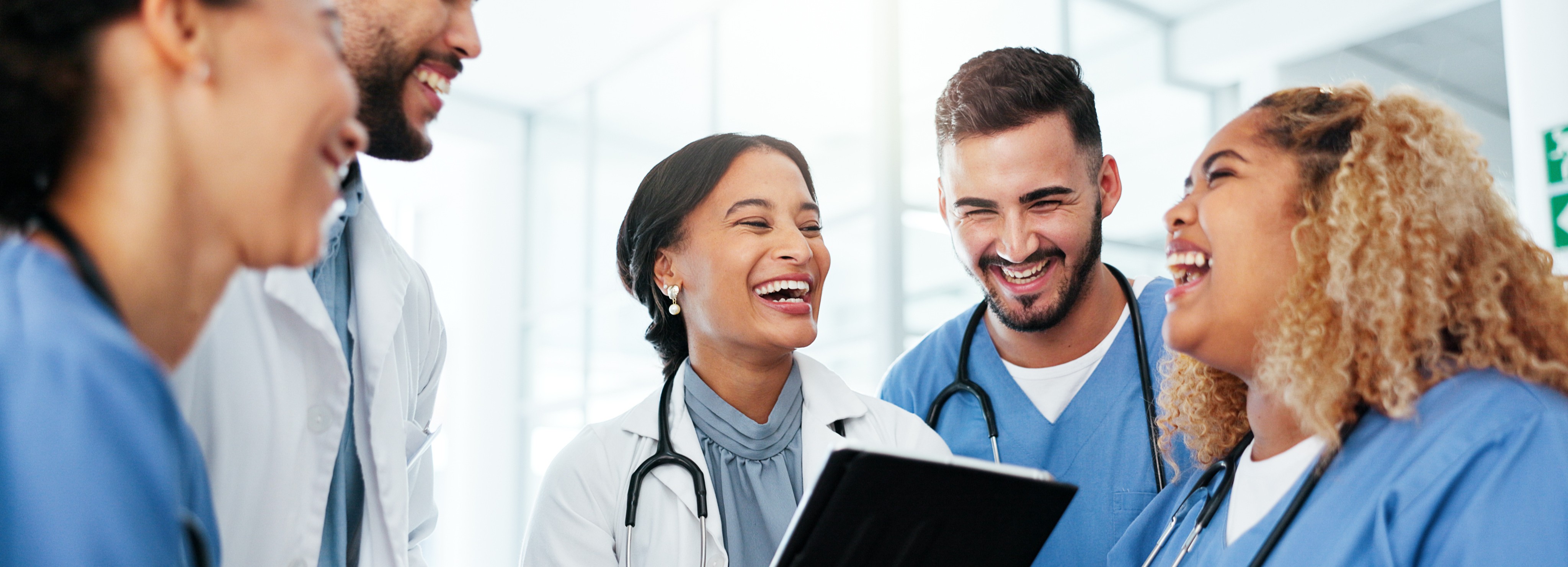 CMA and doctors talk happily at the hospital
