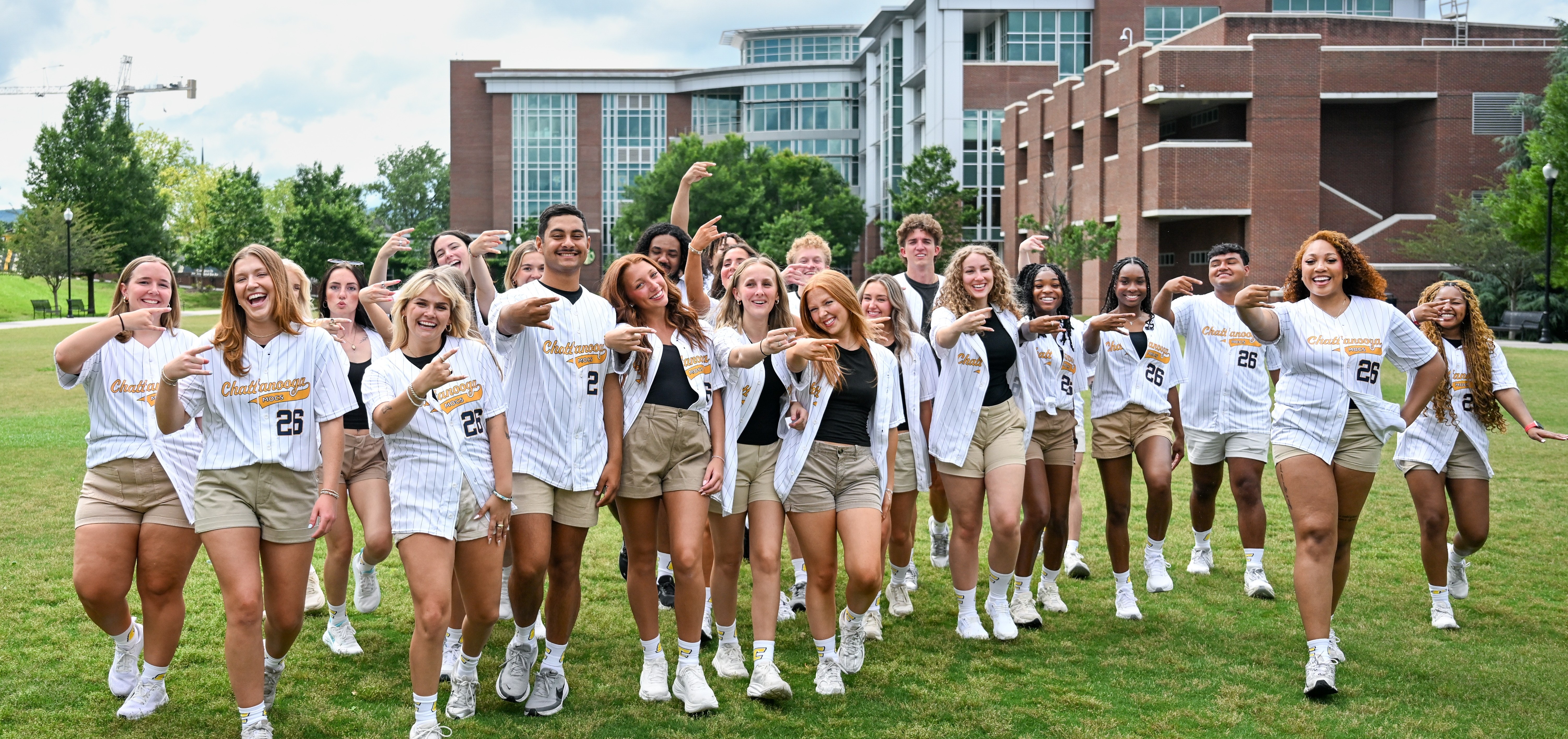 Orientation Leaders walking on Chamberlain Field
