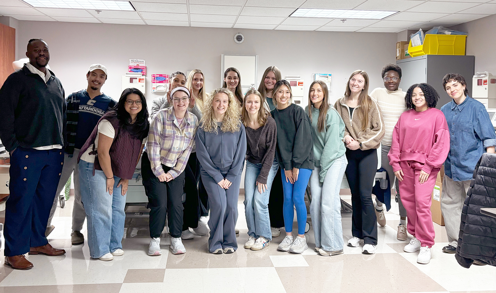 ABSN students in Nursing lab pose for group photo