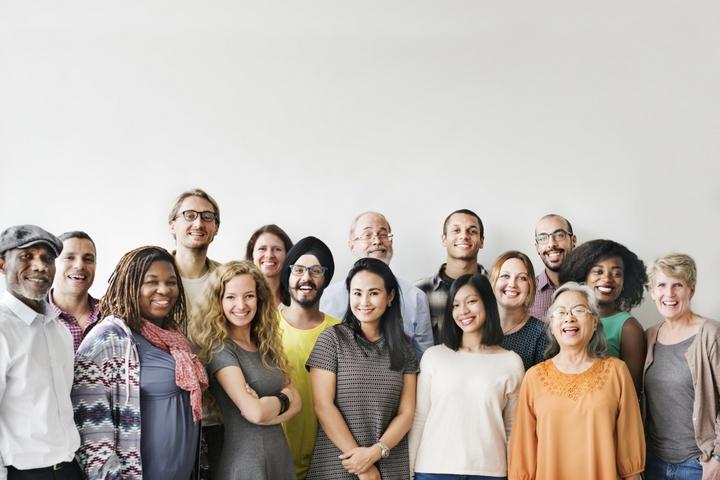 People standing and smiling for a picture