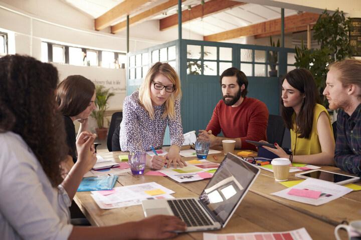 Woman taking lead in a meeting