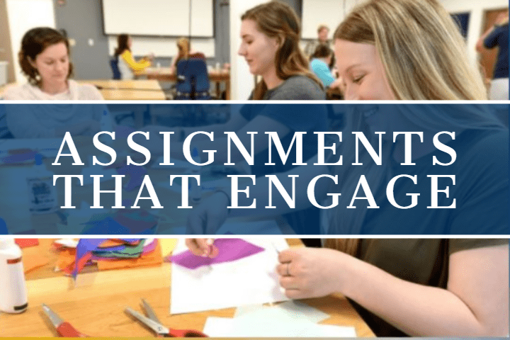several students working on assignments at a desk