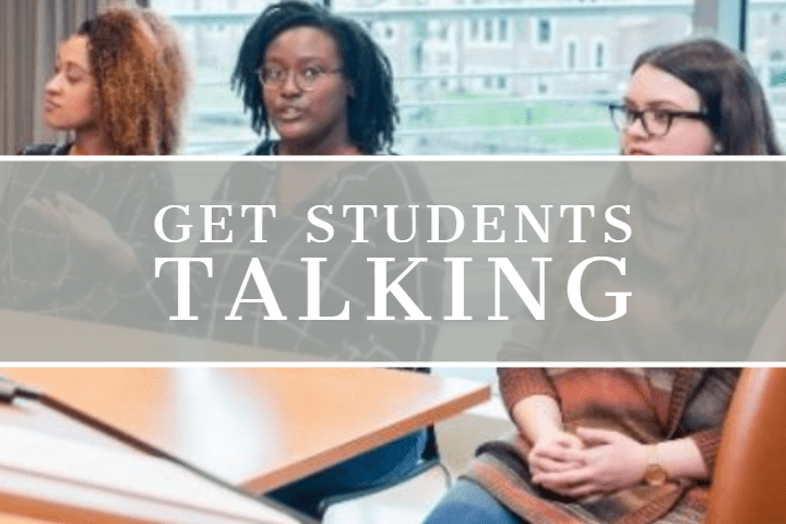 students at a conference table